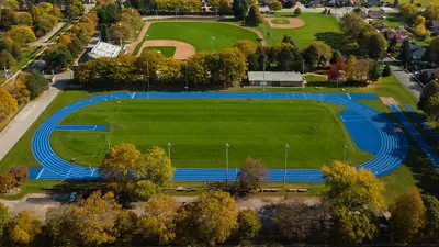 Aerial summer view of the blue outdoor track at Oakes Park in Niagara Falls Ontario.